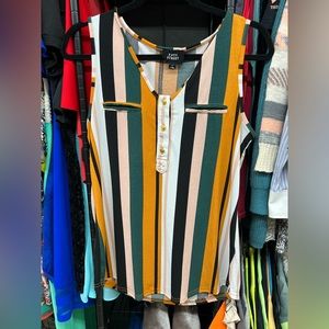 Colorful tank looks great with black dress pants.